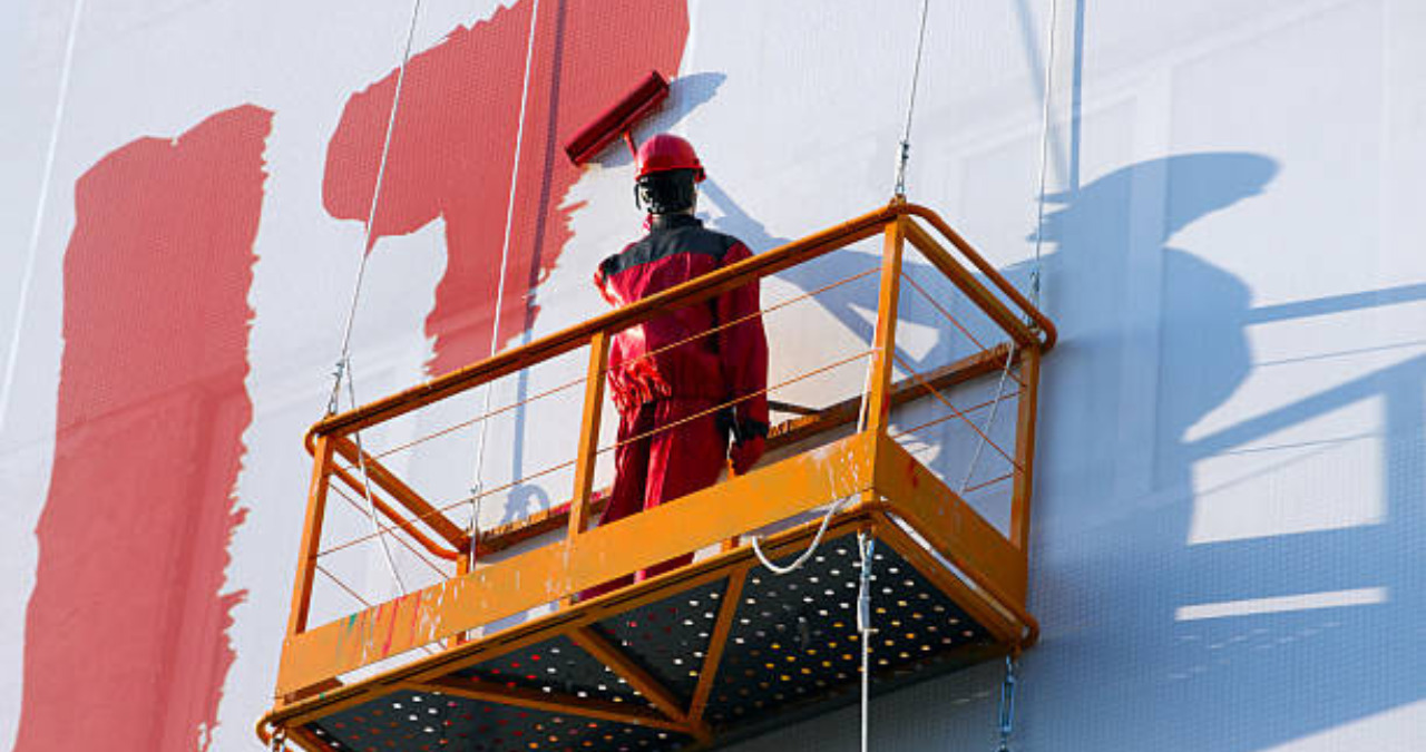 painting a building