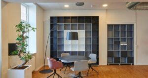 A modern office interior with clean walls and contemporary decor, showing the benefits of painting your office professionally.